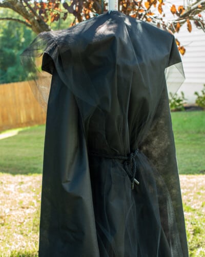 Draping tulle over yard fabric witch.