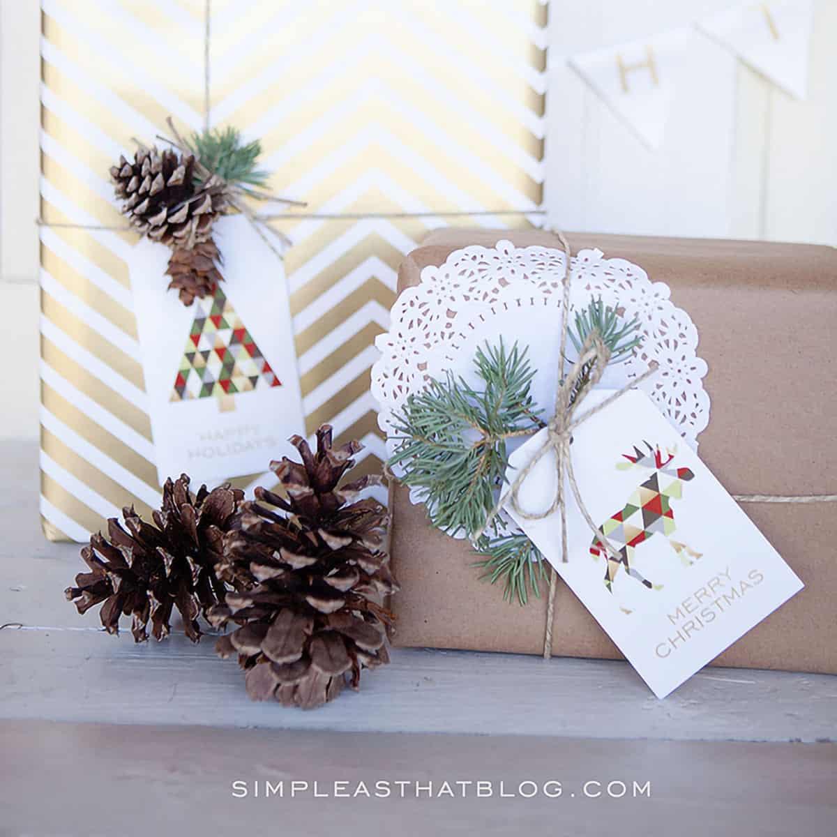 Christmas presents wrapped in brown and gold paper tied with twine adorned with pine sprigs and pinecones feature geometric shape collage style gift tags.