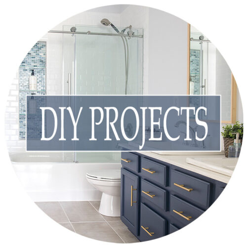 Navy and white transitional bathroom with DIY projects text overlay.