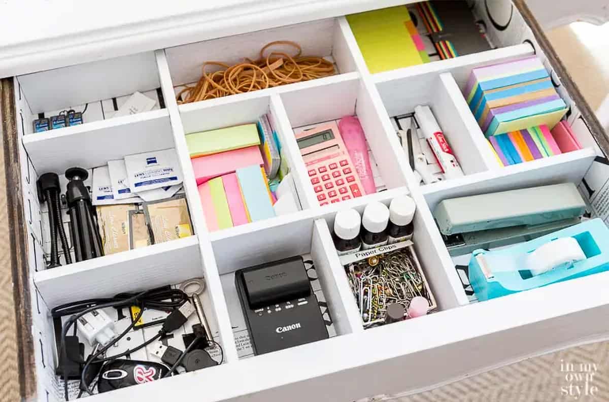 Wooden desk drawer dividers separate office drawer into specific areas for paper, rubber bands, paper clips, tape, and more.