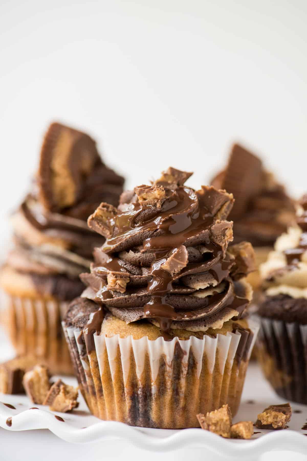 Reese's cupcakes with chocolate and peanut butter swirl frosting.