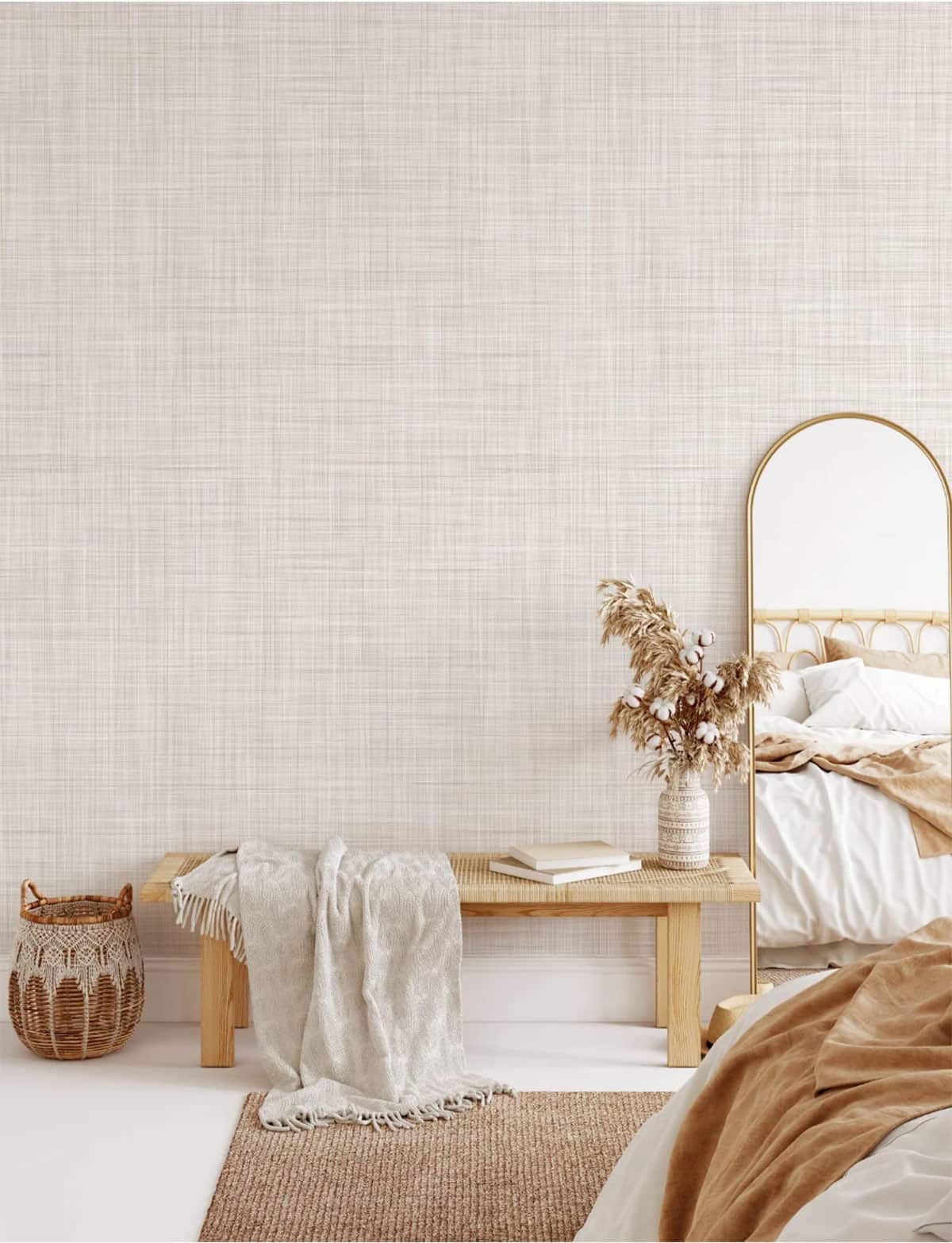 Grass cloth Wallpaper features a cream linen taupe design in a neutral bedroom.