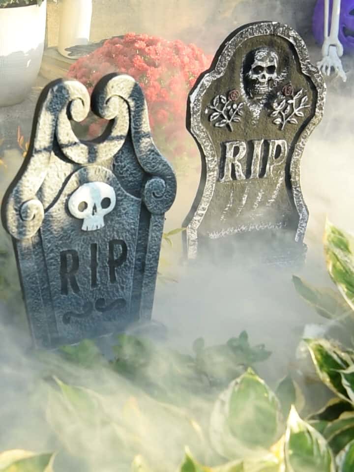 Tombstones with low lying fog around them.