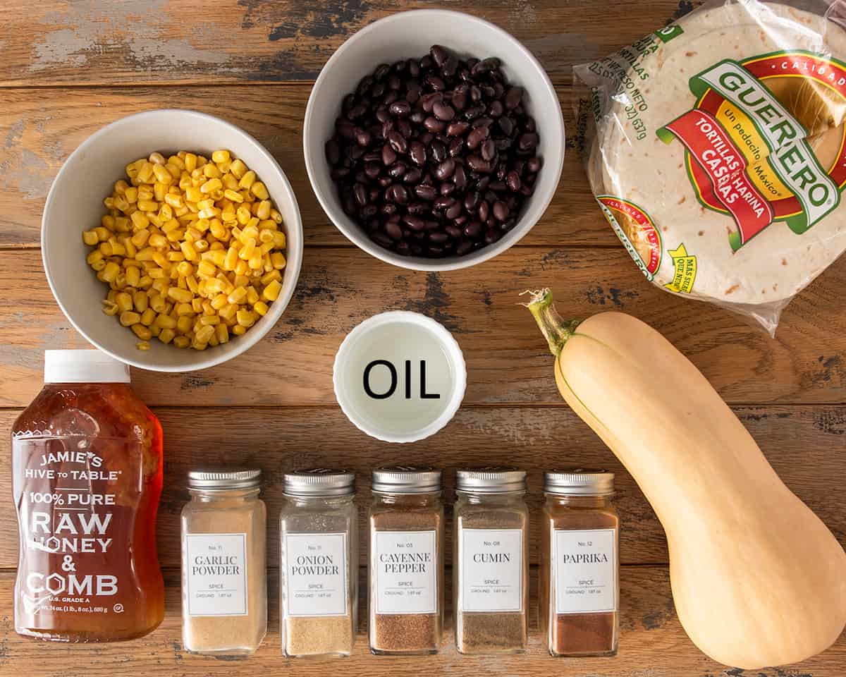 Ingredients to make roasted butternut squash tacos laid on a table.