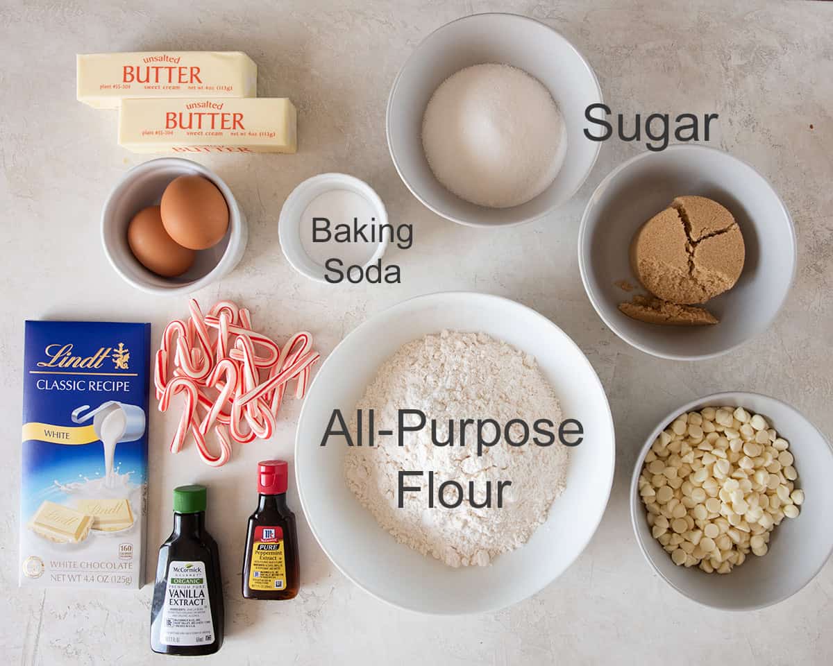 Ingredients to make peppermint white chocolate Christmas cookies on a table.