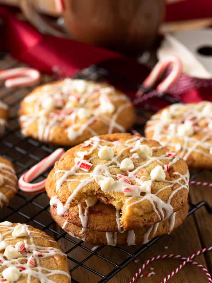 Peppermint white chocolate chip cookie with a bite taken out.