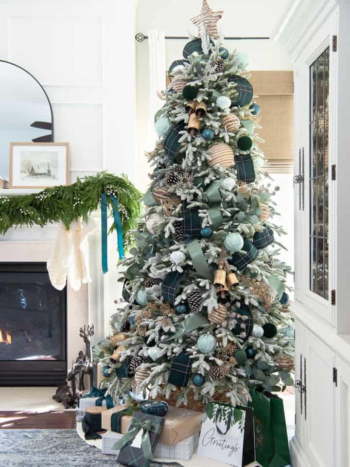 Gold and Green Christmas tree decorated color scheme in a white living room.